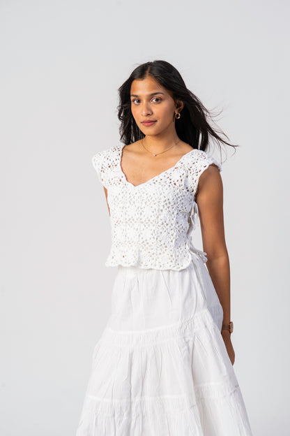 Model wearing Fleur crochet cover up by Ritika Dacha