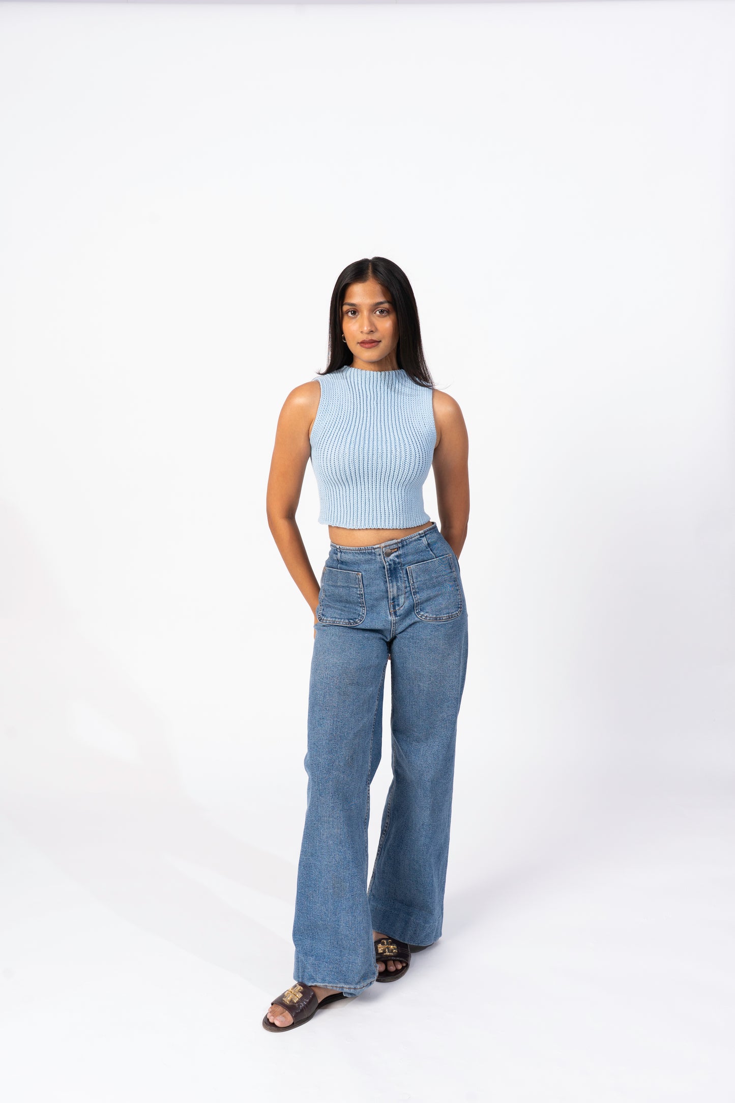 model wearing powder blue ease tank crochet top full profile
