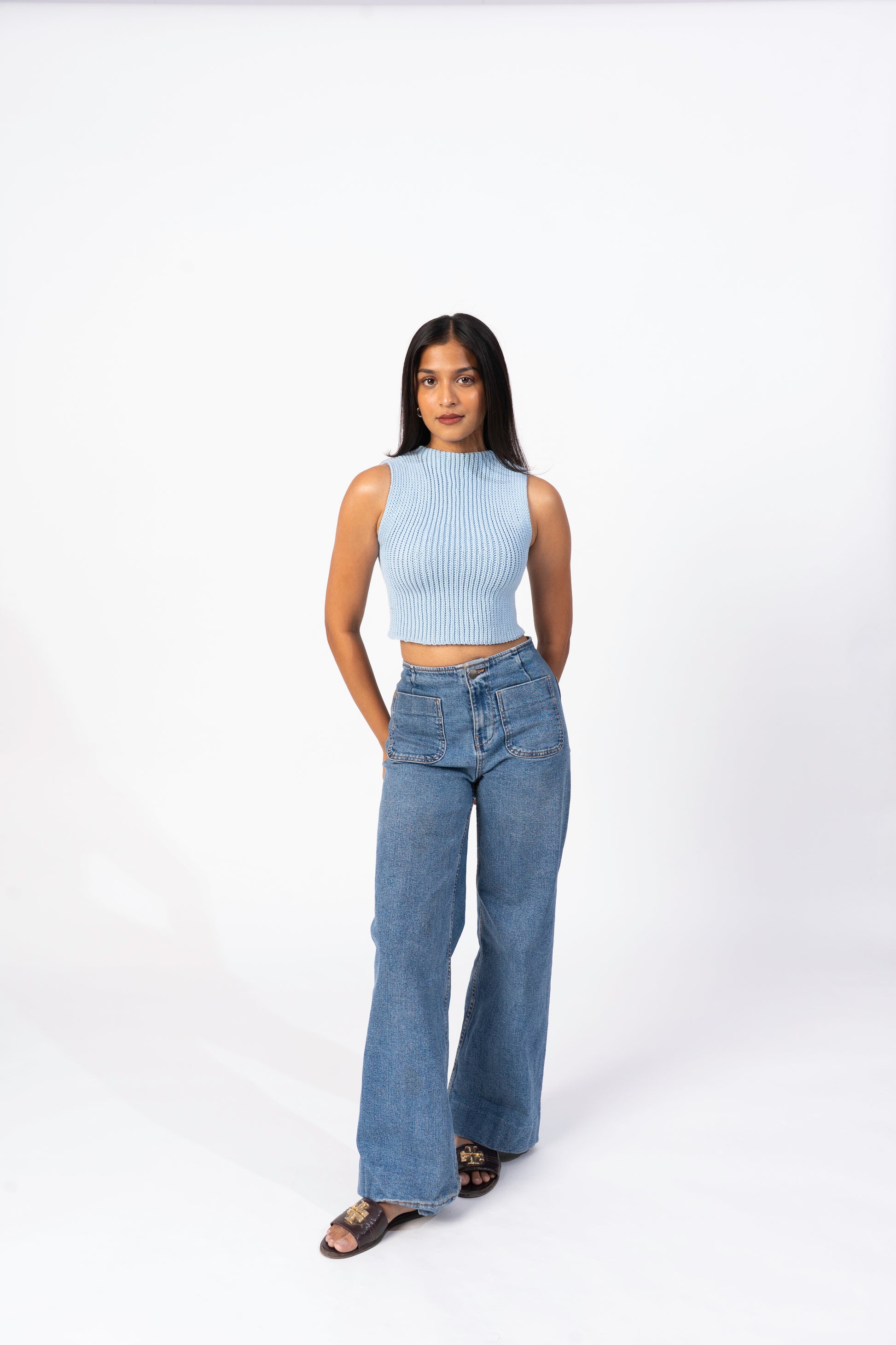 model wearing powder blue ease tank crochet top full profile