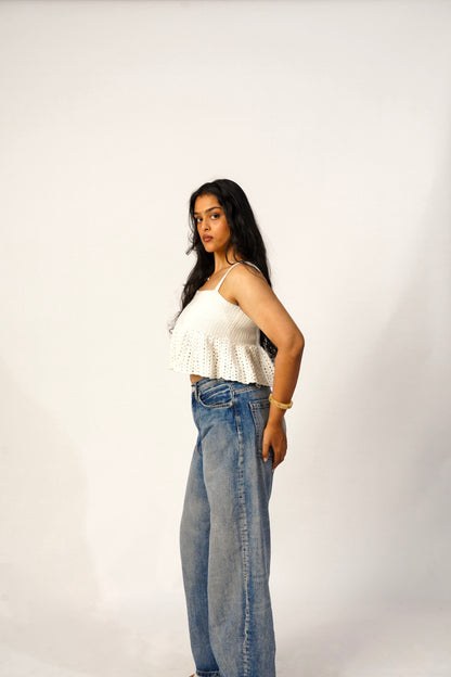 Side profile of handmade ivory crochet top