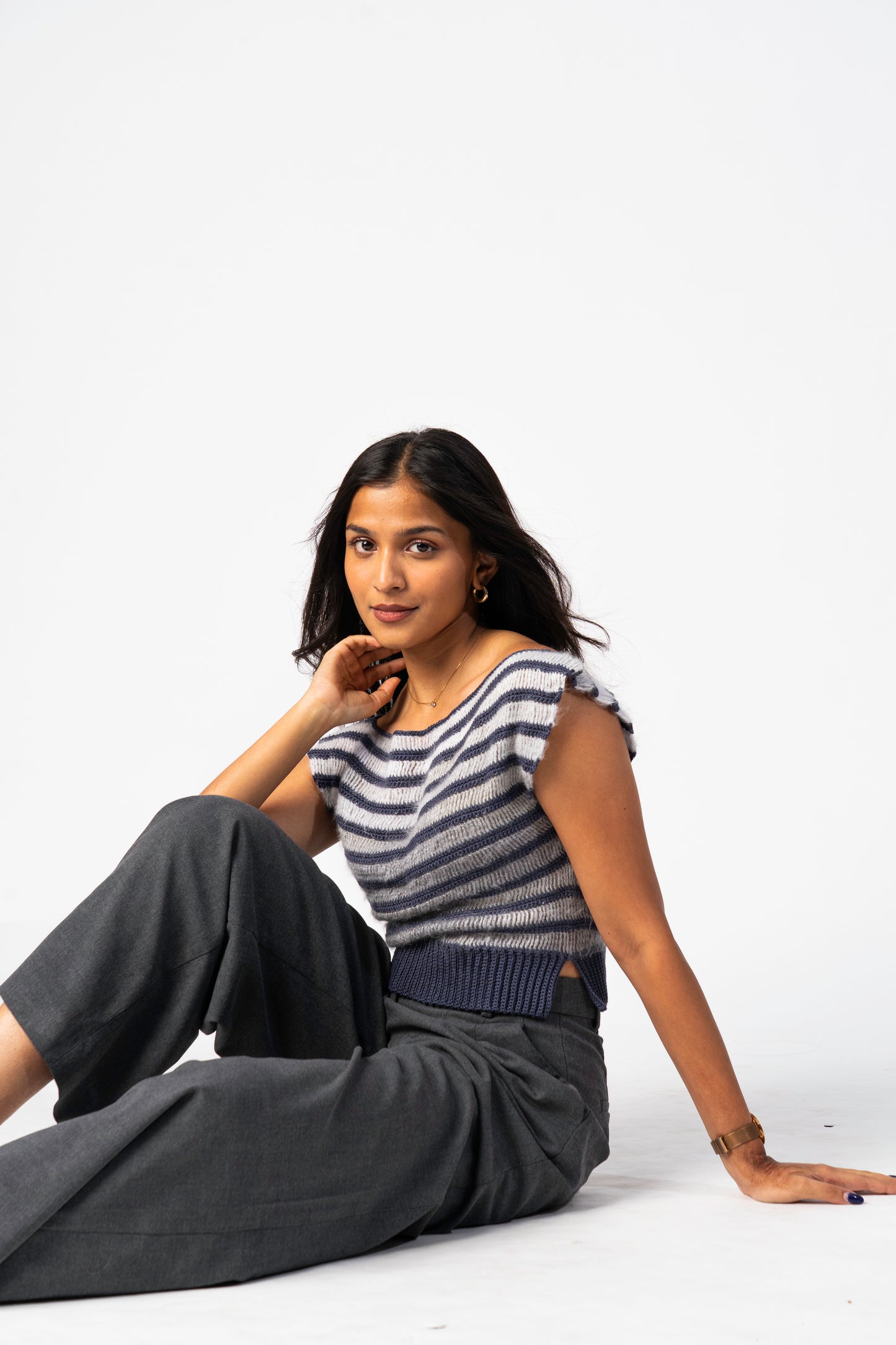 model wearing the crochet striped haze top